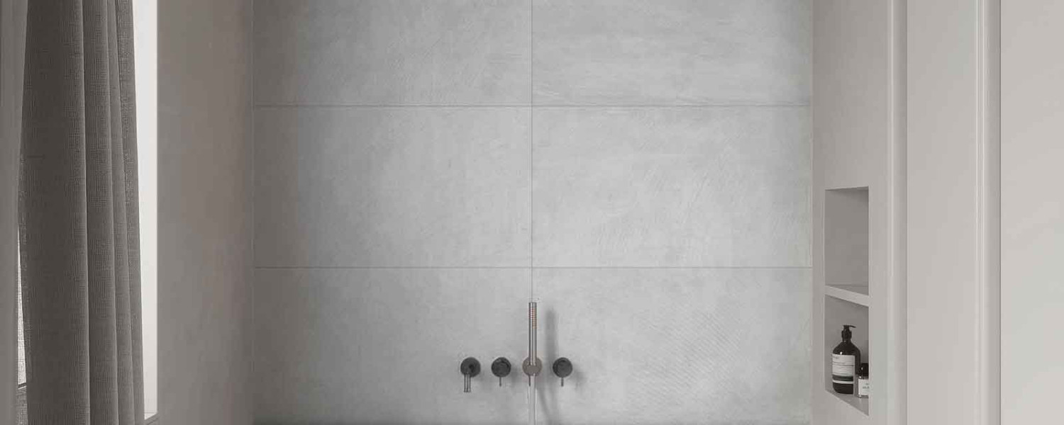 ease_baño_gris_elegante_azulejos_porcelanico