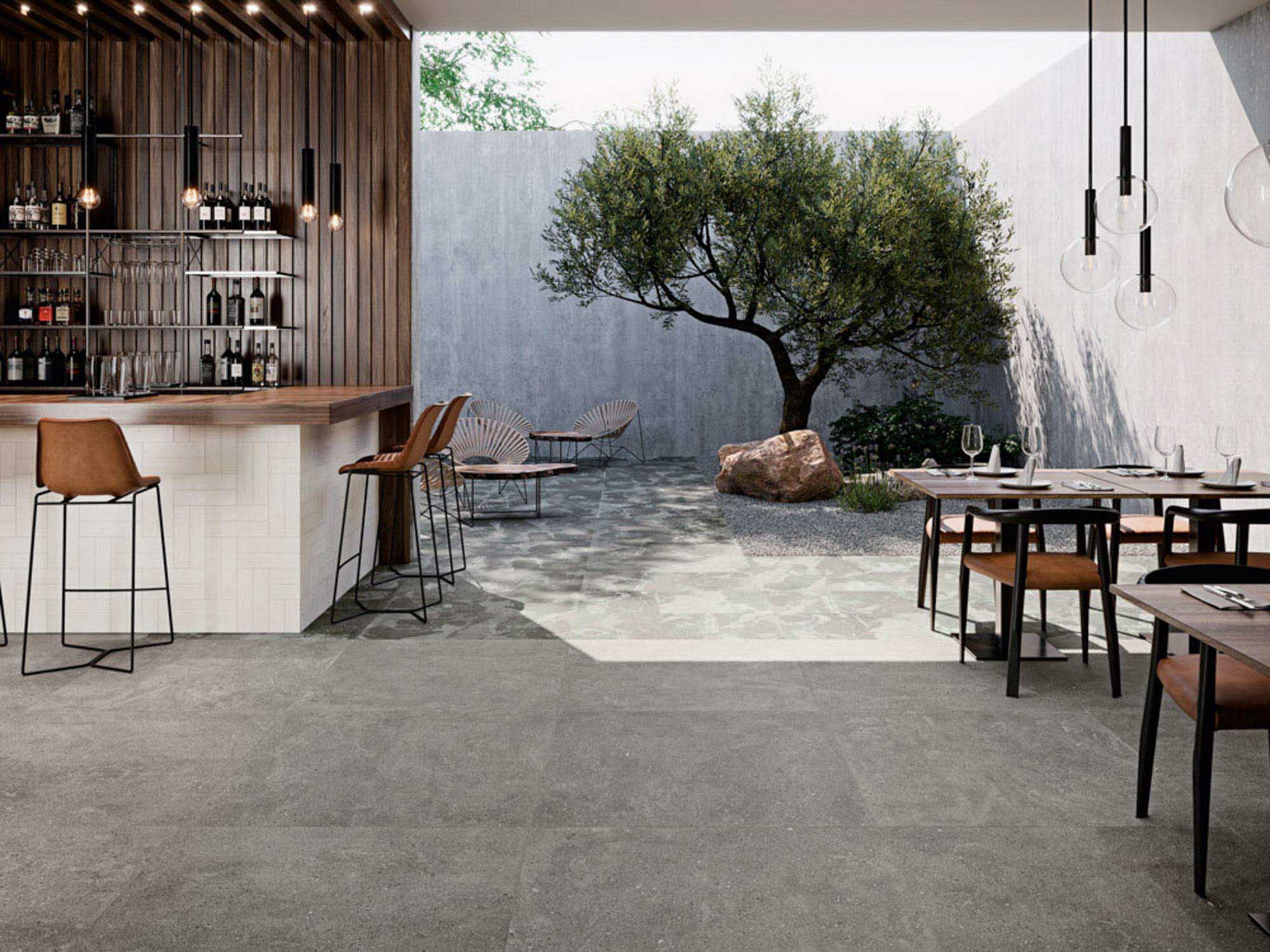 suelo porcelánico Aparici tipo piedra para interiores y exteriores