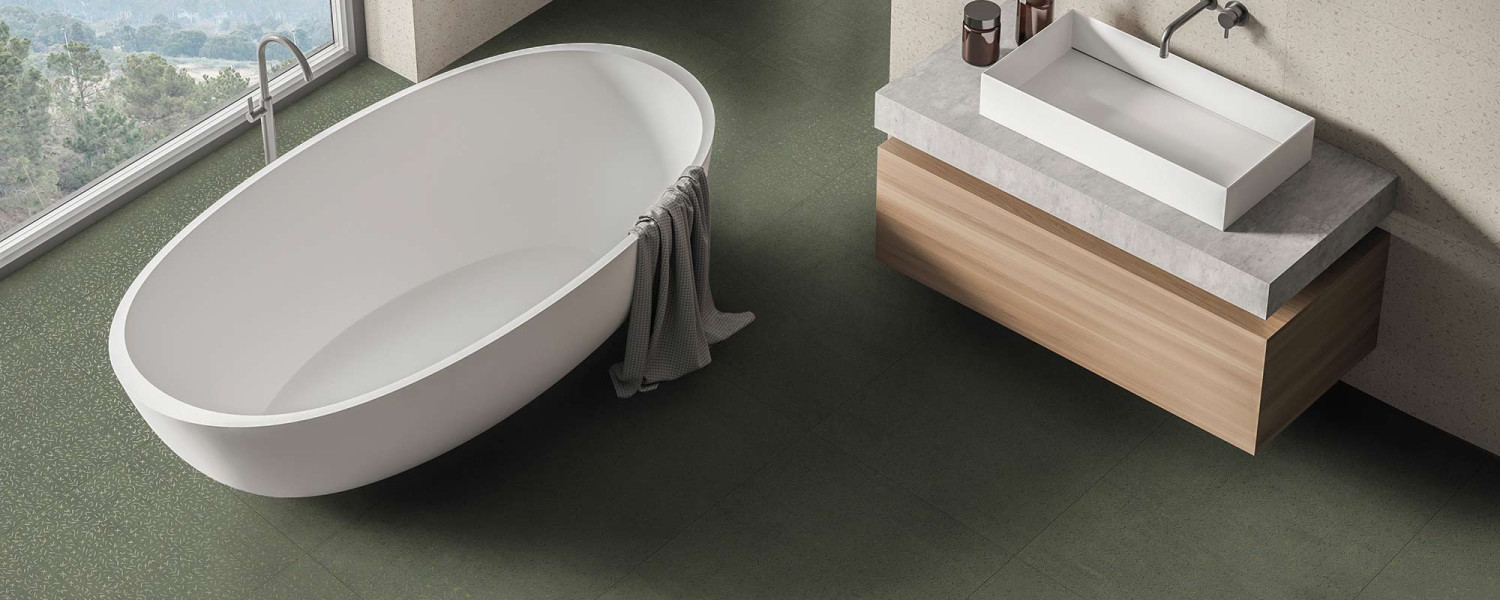 stitch_baño_suelo_verde_paredes_grises_deco
